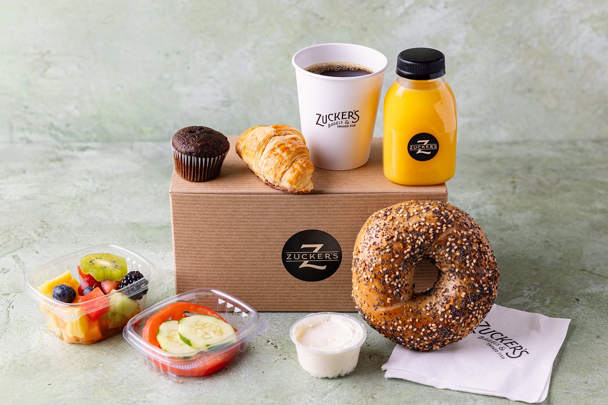 Zucker's catering box with bagels, schmears and orange juice — NYC & NJ office catering delivery